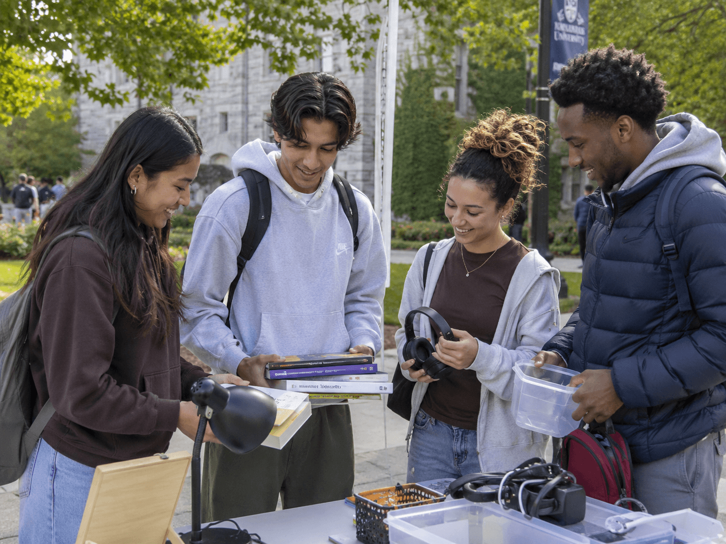 Students exchanging marketplace items on campus